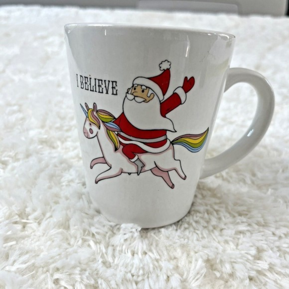 Modern Gourmet Foods Stoneware “I Believe” Santa Riding Unicorn 12 Oz Coffee Mug